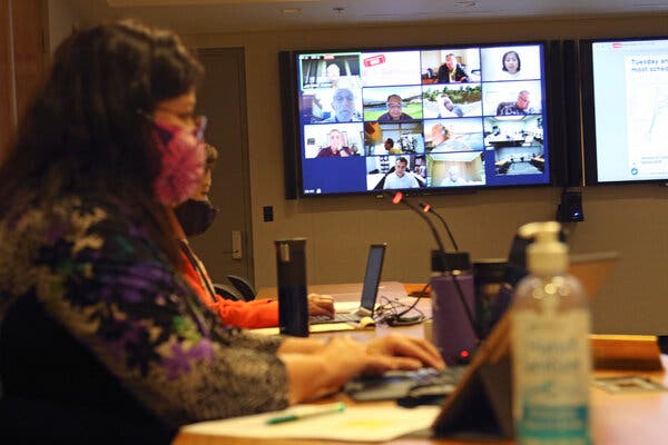 University of Hawaii employees monitor a Board of Regents meeting via Zoom. The teleconference company’s revenue surged more than 300 percent in its fiscal year.