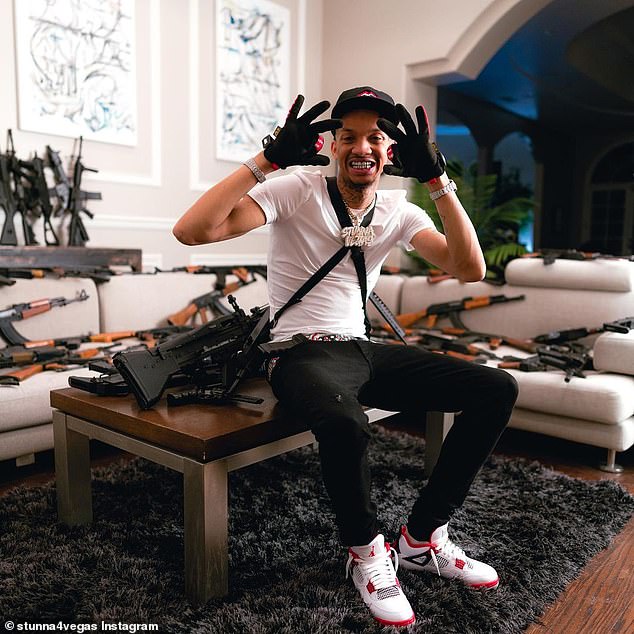 In other social media clips of the property, the rapper's associates are seen brandishing large sets of firearms on the premises