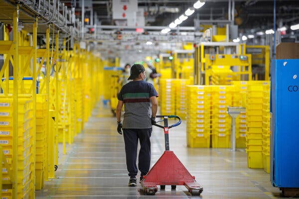 An employee at Amazon’s distribution center in Staten Island in November.