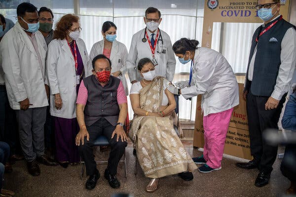 The Indian health minister, Harsh Vardhan, and his wife, Nutan Goel, received the Covaxin shots, developed by the Indian company Bharat Biotech, at a hospital in New Delhi on Tuesday.