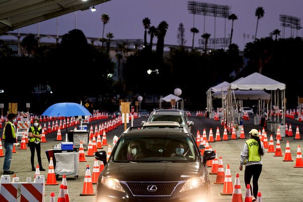 A drive-through vaccination site at Dodger Stadium in Los Angeles last week.