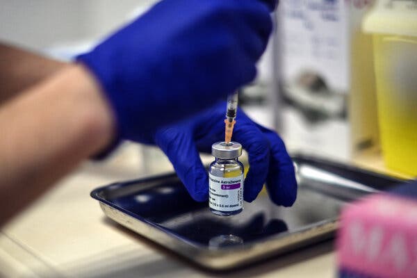 A nurse prepared a dose of the AstraZeneca Covid-19 vaccine in Lyon, France, in February.