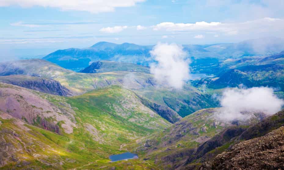 View from summit top of Scafell Pike, looking north-west over Styhead tarn and Derwent Water in far distance.