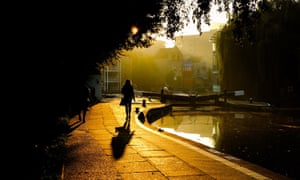 Walker by a canal