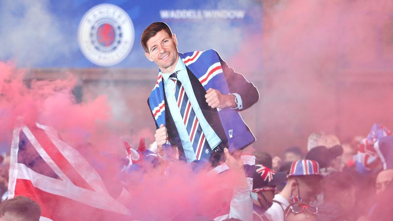 Rangers fans - Ibrox Stadium
Rangers fans celebrate outside of the Ibrox Stadium after Rangers win the Scottish Premiership title. Picture date: Sunday March 7, 2021.