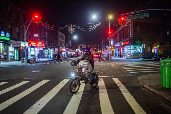 Delivering items in New York in January. Workers have often been targeted for their electric bikes, which can cost thousands of dollars.