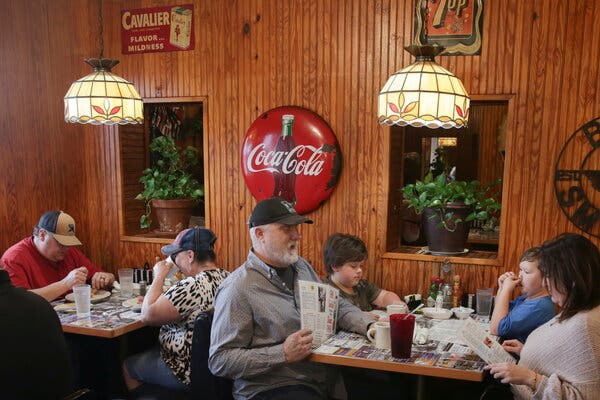 Masks were off in Bill Smith’s Cafe in McKinney, Texas, after Gov. Greg  Abbott issued a rollback of coronavirus prevention restrictions.