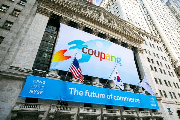 A banner for the South Korean retailer Coupang hung in front of the New York Stock Exchange on Thursday, the day the company’s shares began trading.