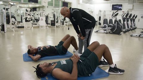 the east la college huskies with john mosley head coach in episode 3 “jenny” of last chance u basketball season 1 c courtesy of netflix © 2021