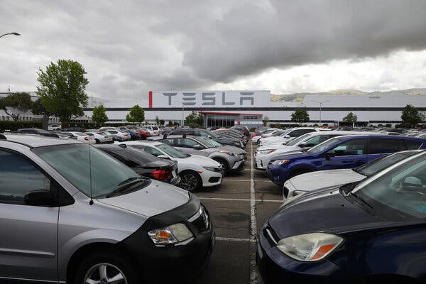 The Tesla car manufacturing plant in Fremont, Calif., remained open during the pandemic despite restrictions put in place by local officials.