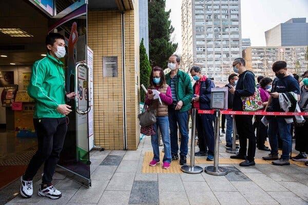 Waiting to receive the Sinovac vaccine in Hong Kong last month.