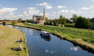 A narrowboat on the River Great Ouse at the Stretham Old Engine, Cambridgeshire, England