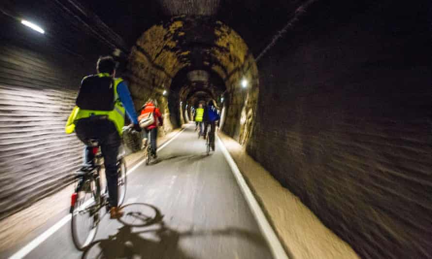Cyclists enjoy riding through the restored Devonshire Tunnel which is part of the Two Tunnels Greenway near Bath