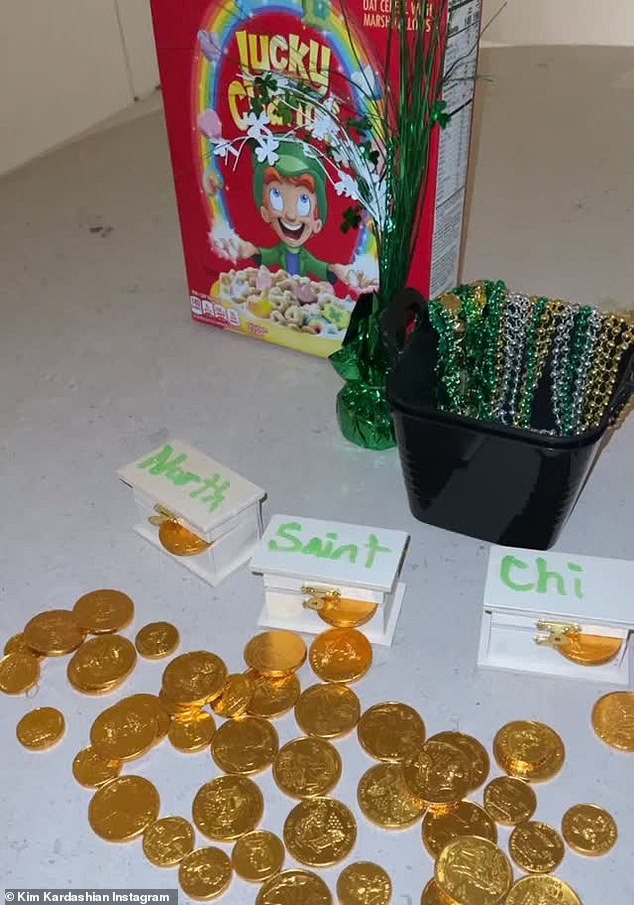 So clever: Each child had their own white box with their name on top in green and a gold coin sticking out. There were also green beaded necklaces and a box of Lucky Charms cereal