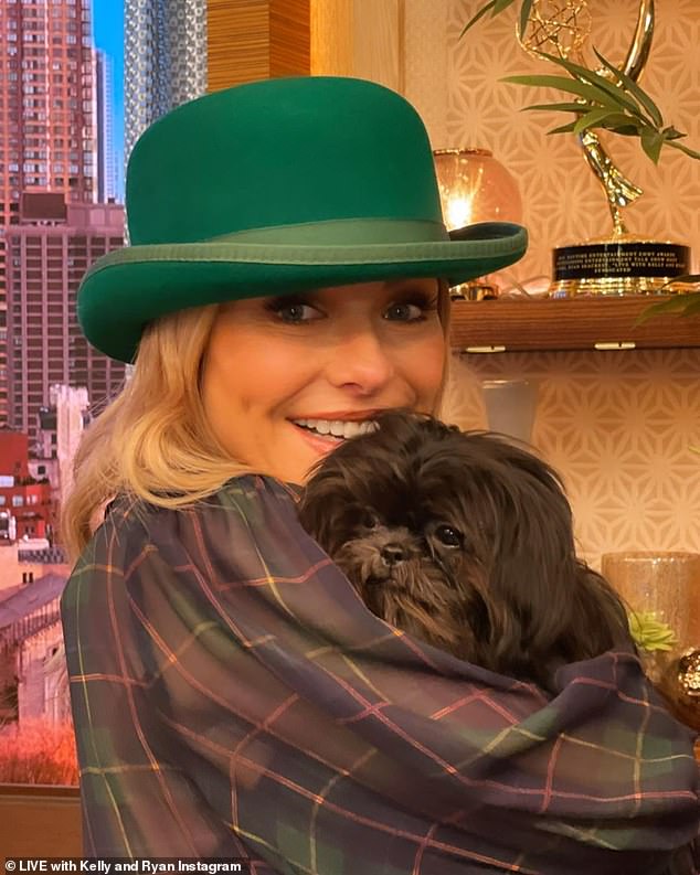 Irish luck: Kelly Ripa got into the spirit on social media as she wore a green hat while holding the dog she recently adopted