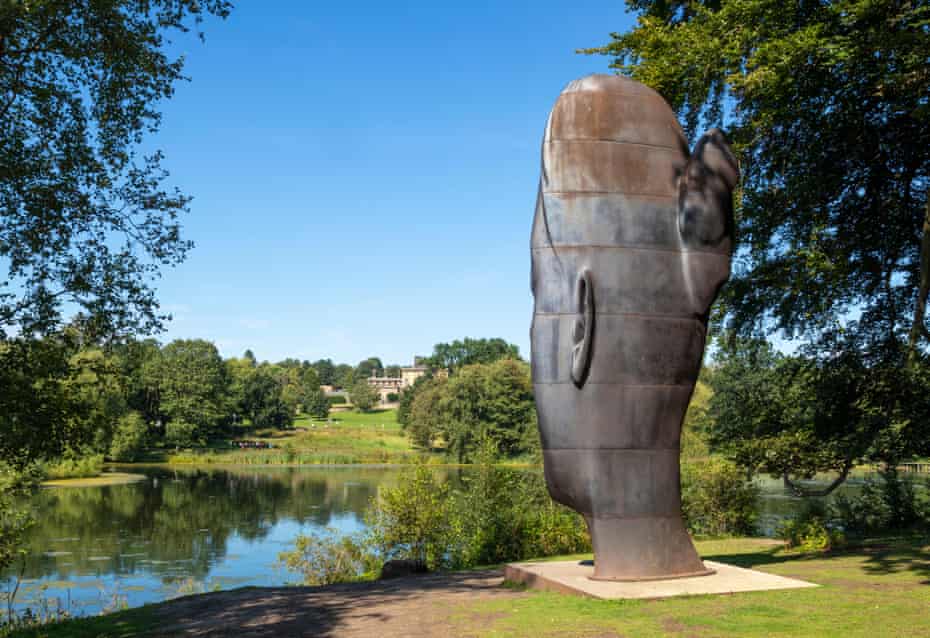 Wilsis by Jaume Plensa a tall cast-iron sculpture of a girls face Yorkshire Sculpture Park