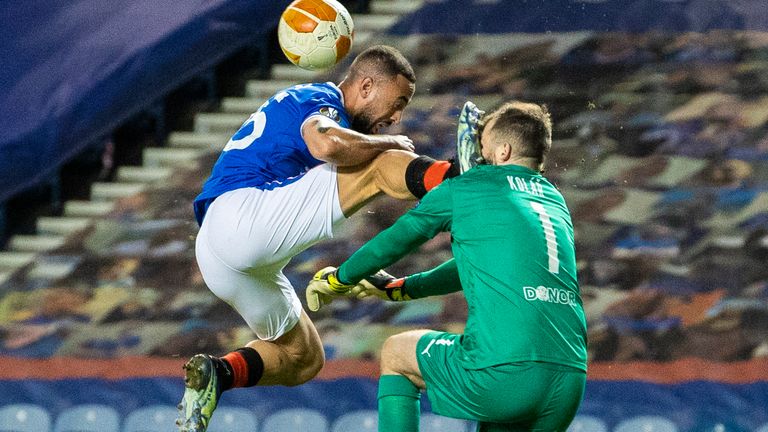 Rangers&#39; Kemar Roofe catches Slavia&#39;s Ondrej Kolar with a boot in the face and is sent off during the Europa League Round of 16 2nd Leg match at Ibrox