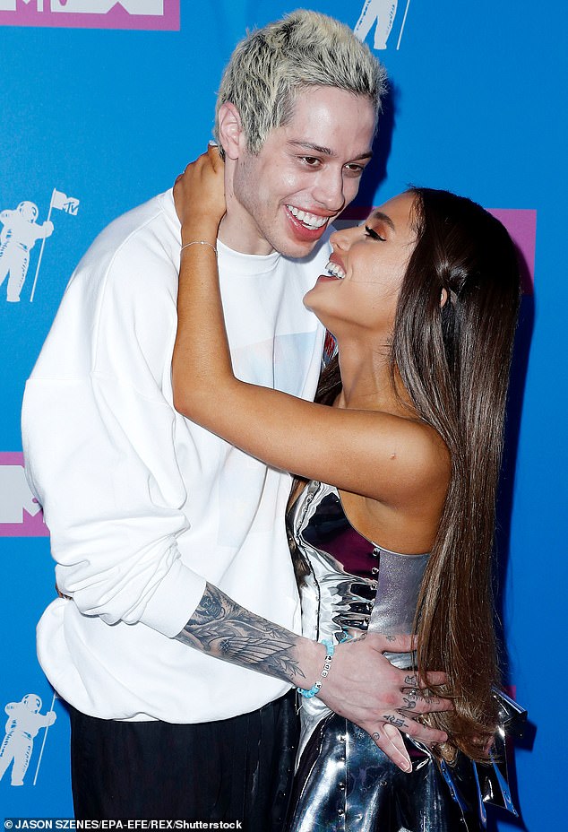 Romantic history: His love life has frequently draw attention, sharing flings with the likes of Margaret Qualley, 26, Kaia Gerber, 19, and Kate Beckinsale, 47, as well as a whirlwind engagement to Ariana Grande, 27 (pictured with Grande in August, 2018)