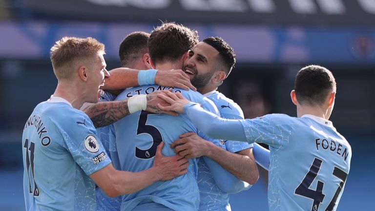 Manchester City players celebrate John Stones&#39; winning goal against West Ham