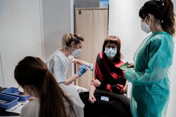 A patient receiving AstraZeneca’s Covid-19 vaccine in Milan on Monday.