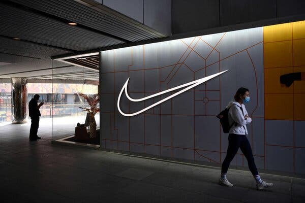 A Nike store in Beijing on Thursday. Nike shares fell in premarket trading after it was criticized on Chinese social media over a statement it made about reports of forced labor in Xinjiang.