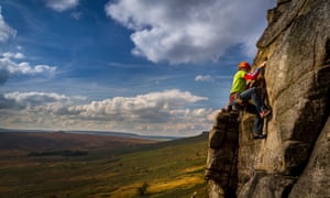 Rock climbing at Stanage Edge, Derbyshire, UK