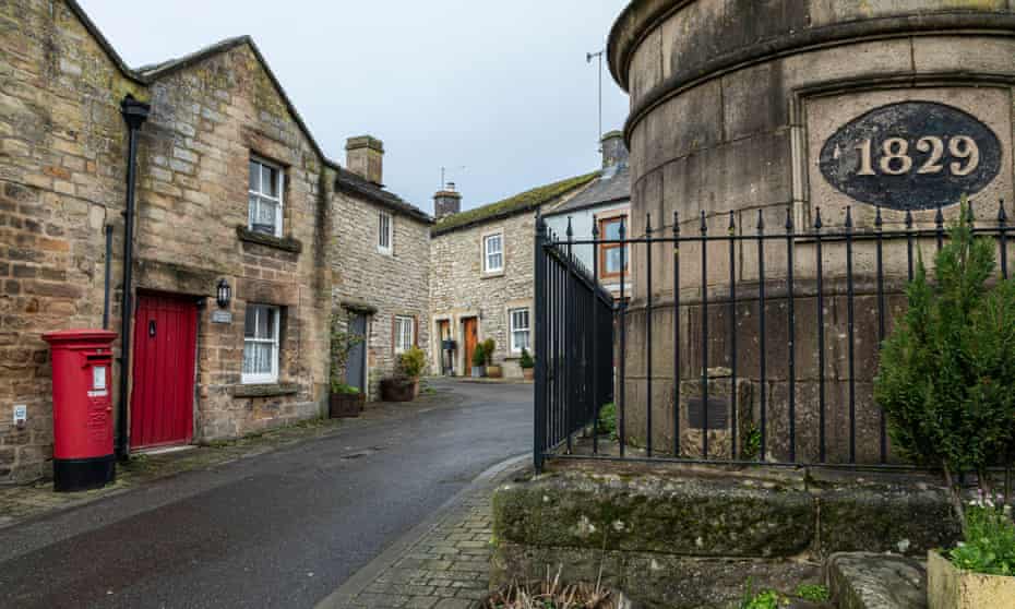 The Victorian water tank and tiny cottages in Youlgrave, Peak District National Park