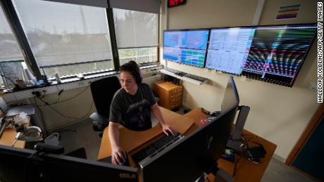 Picture taken on February 27, 2021 shows a natural hazards specialist at the Icelandic Meteorological Office in Reykjavik, which is surveying the situation at the Reykjanes peninsula, Iceland.