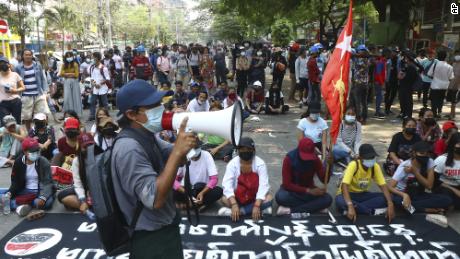 Protesters occupy a street during a rally against the military coup on Saturday in Tarmwe township in Yangon, Myanmar.