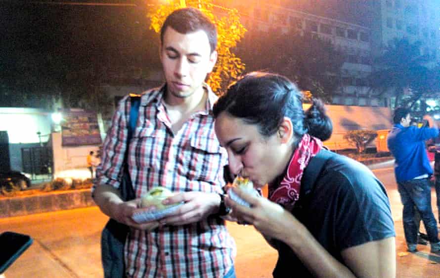 Leyla Kazimand her husband Matt eating vada pavs in Mumbai