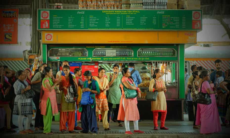 Women waiting to board the women-only carriage at a Mumbai railway station.