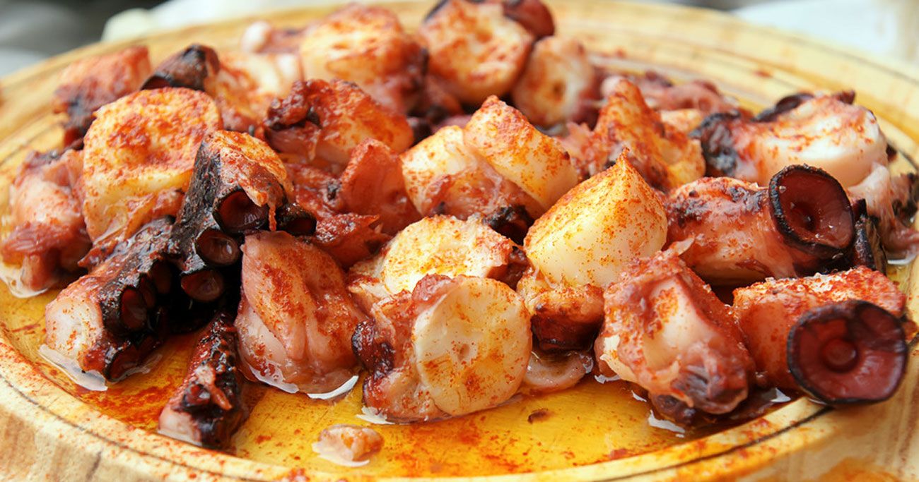 Pulpo a la Gallega is served in olive oil with salt and paprika