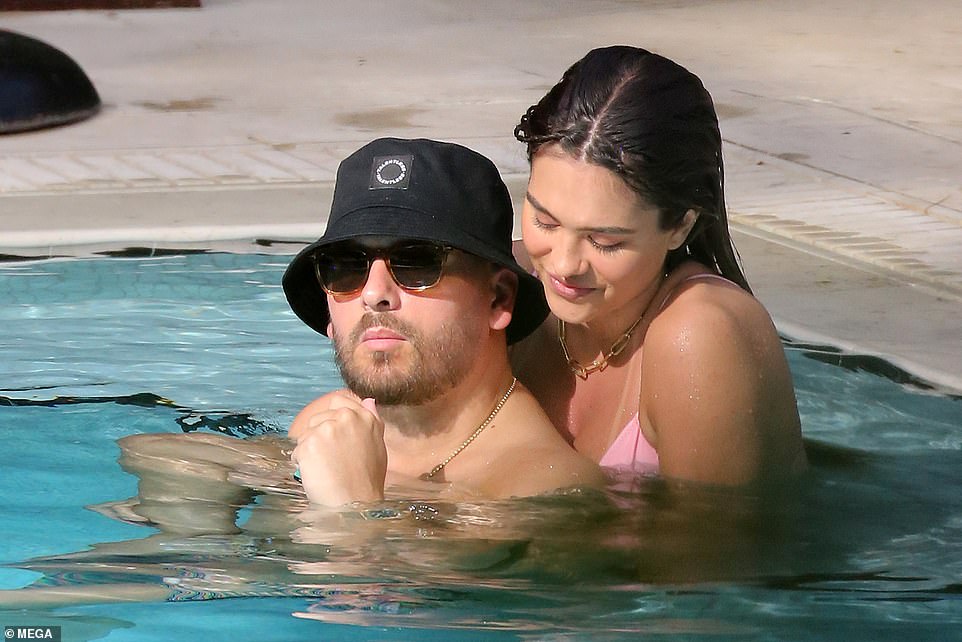 Dreamy: The loved-up pair were later seen packing on the PDA as they relaxed poolside at a nearby hotel