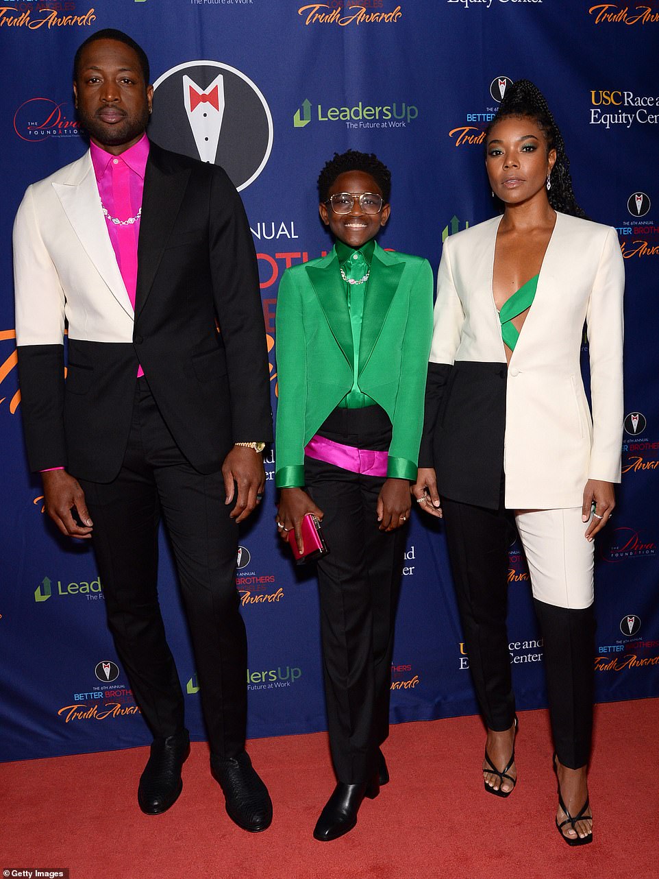 Family home: Dwyane Wade, Zaya Wade and Gabrielle Union are seen at an event on Saturday in Los Angeles last March