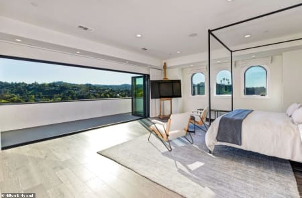 Bedroom bliss: This wrap around balcony with city views is the perfect morning coffee spot