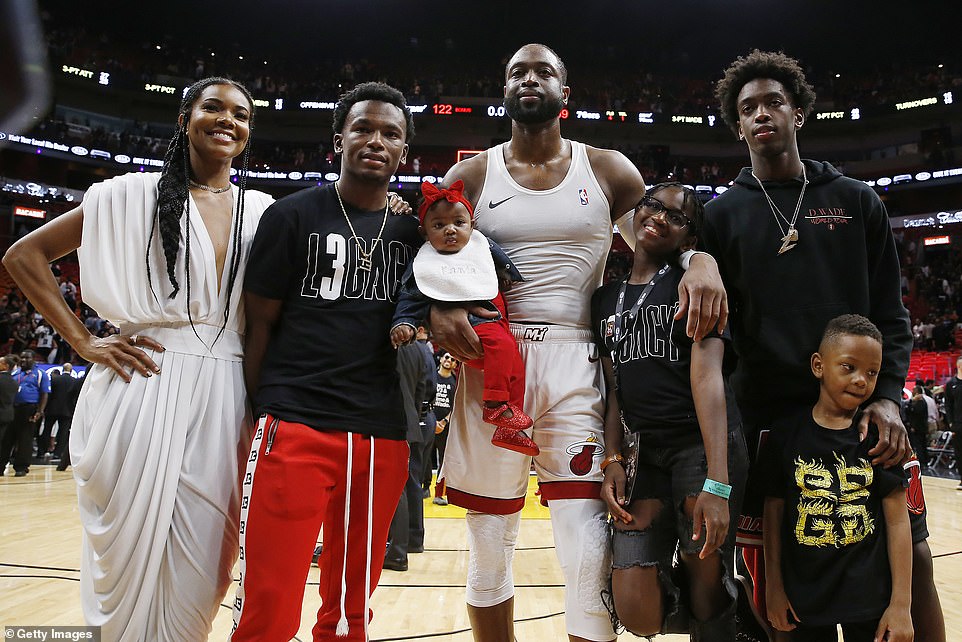 Bigfamily: Dwyane with Gabrielle, nephew, Dahveon Morris, and children, Kaavia James Union Wade, Zaire Wade, Xavier Wade and Zaya Wade