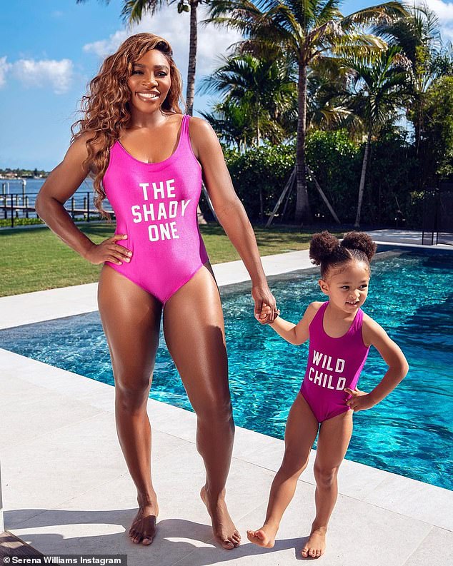 So happy together: The 39-year-old tennis champ and her mini-me Alexis Olympia Ohanian Jr, age three, stood side by side near the swimming pool in their backyard of their Florida mansion