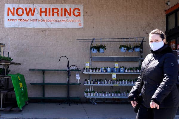 A “help wanted” sign at a Home Depot in Mount Prospect, Ill. Confidence about hiring in the U.S. economy is growing. 