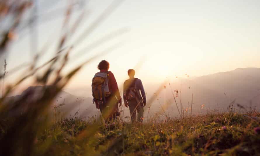 Couple hiking in the mountains near Salzburg