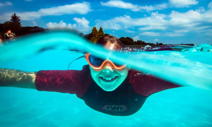 Summer weather July 27th 2018Olivia Batty enjoys swimming in the sun at Ilkley Lido in Yorkshire as the heatwave continues in parts of the UK. PRESS ASSOCIATION Photo. Picture date: Friday July 27, 2018. See PA story WEATHER Hot. Photo credit should read: Danny Lawson/PA Wire