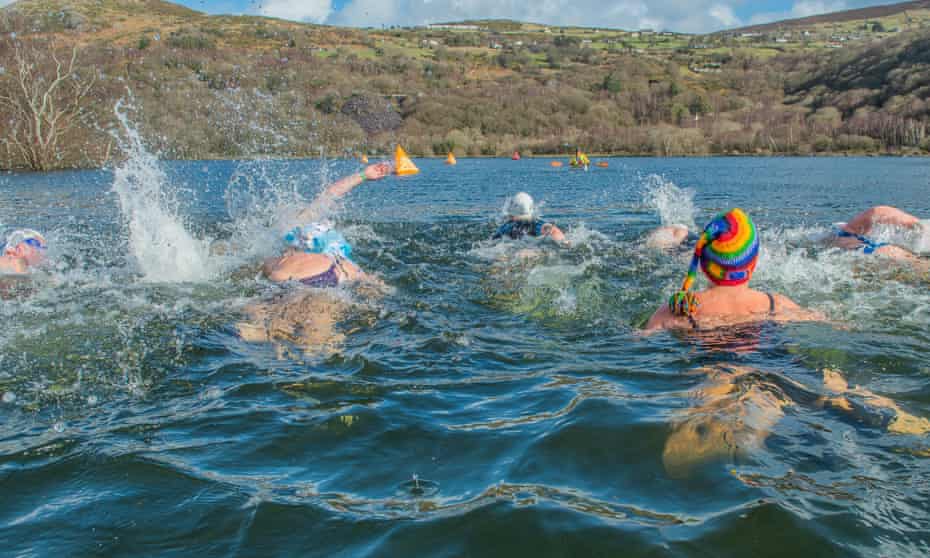 Swimmers in water for Welsh Winter Swim Love Swim Run, UK.