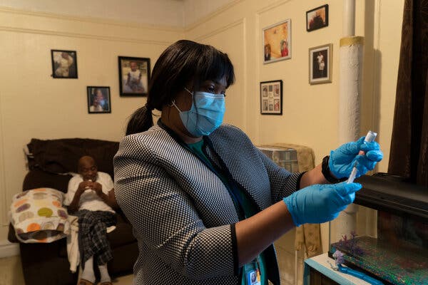 A nurse visiting homebound people in the Bronx on Monday prepared the Johnson &amp; Johnson vaccine. On Tuesday, federal authorities urged a pause in the use of the vaccine.