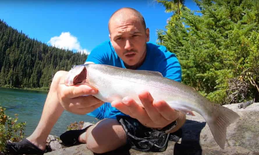 The author with a large trout he'd caught