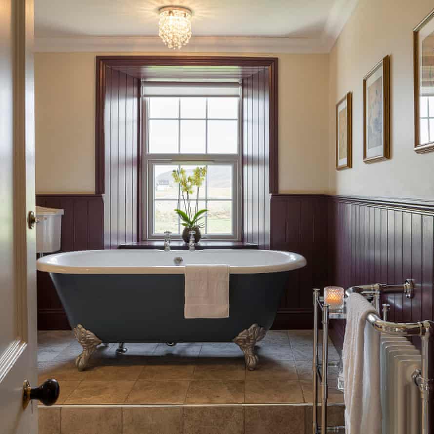 Bathroom of deluxe room at Smoo Lodge, Durness, Sutherland, UK