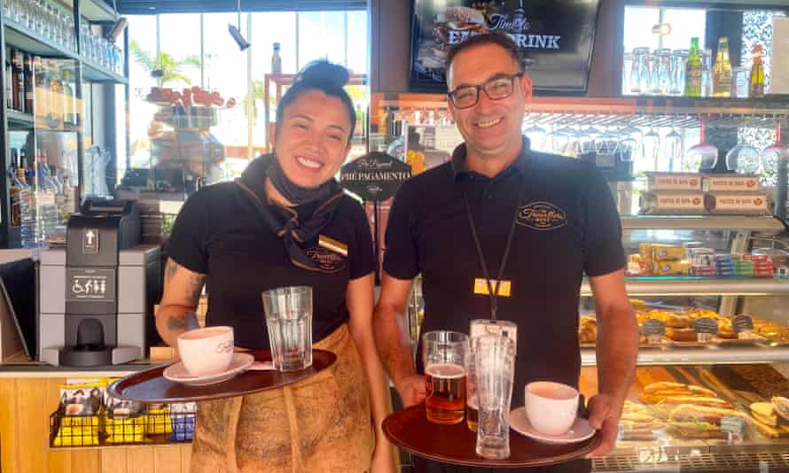 Pedro Pires and co-worker Layara Matias at the Travellers Rest bar-restaurant at Faro airport, Portugal.