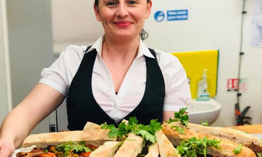 Waitress with platter of food, Kezban restaurant, Leith Edinburgh