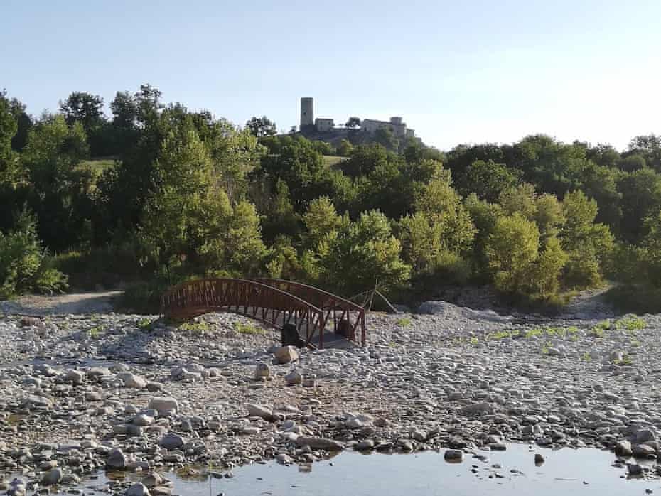 A dried up river and a bridge to nowhere, in San Giovanni in Galilea, Italy.