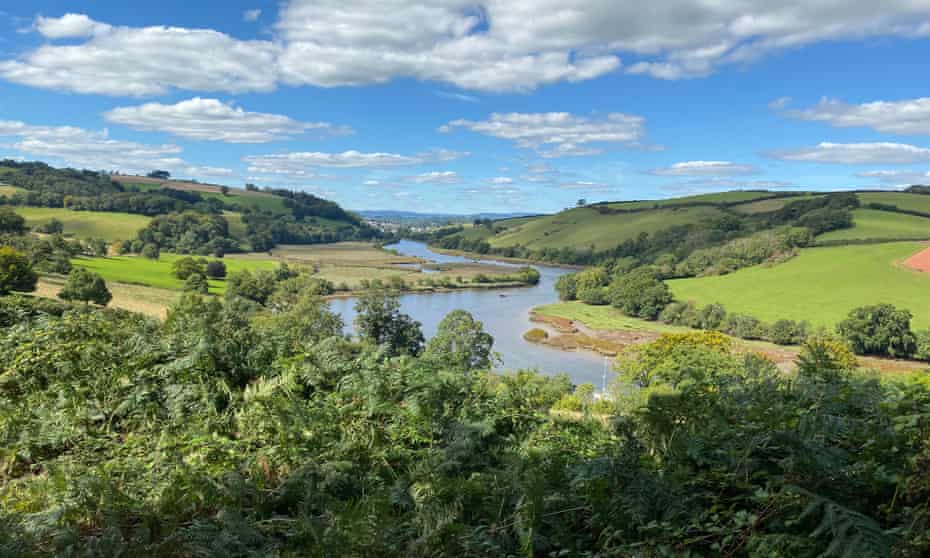 Country RiverA wide river runs through country fields in the summer sun. Taken of the River Dart from near Totnes, Devon.