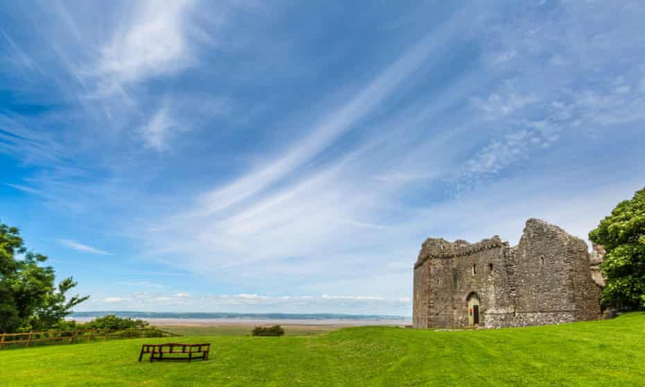 Weobley Castle with saltmarsh beyond.