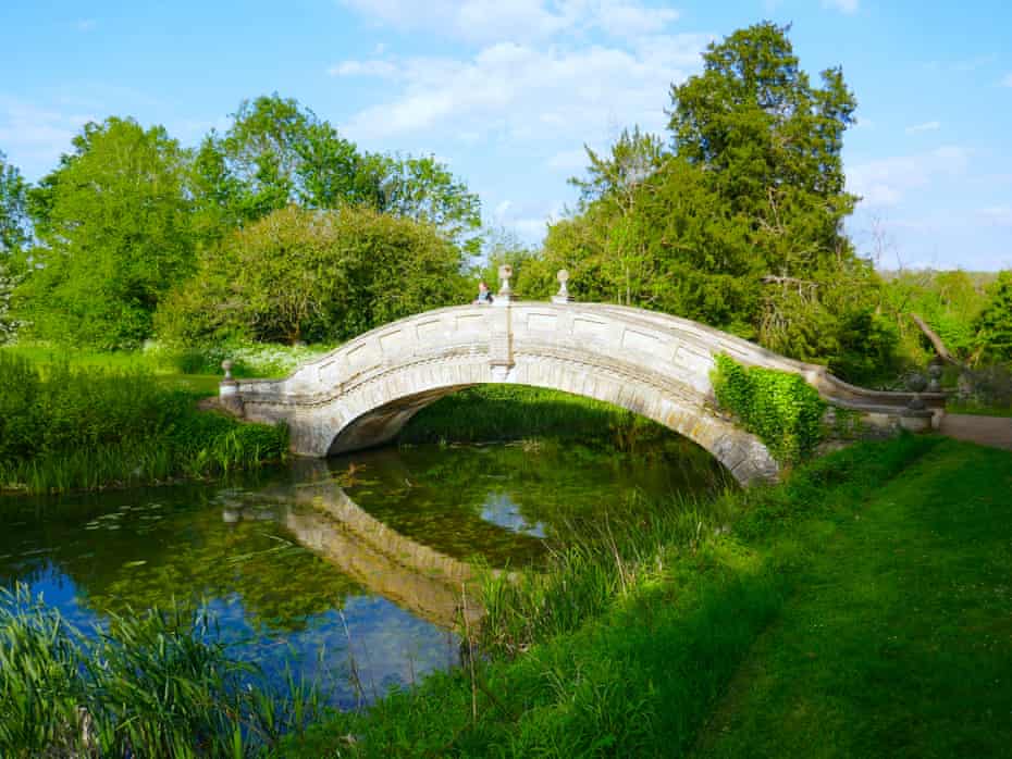 Writer Phoebe Taplin on the estate’s Chinese bridge, Wrest Park, Bedfordshire, UK.